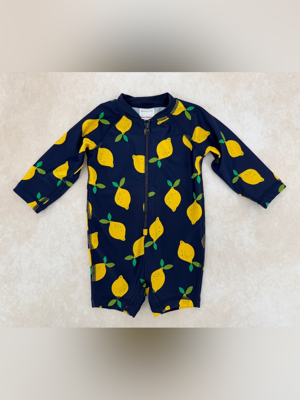 Hanna Andersson Navy and Yellow Lemon Zip One-Piece Swimsuit